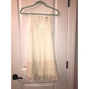 Cream sleeveless dress with crochet detailing